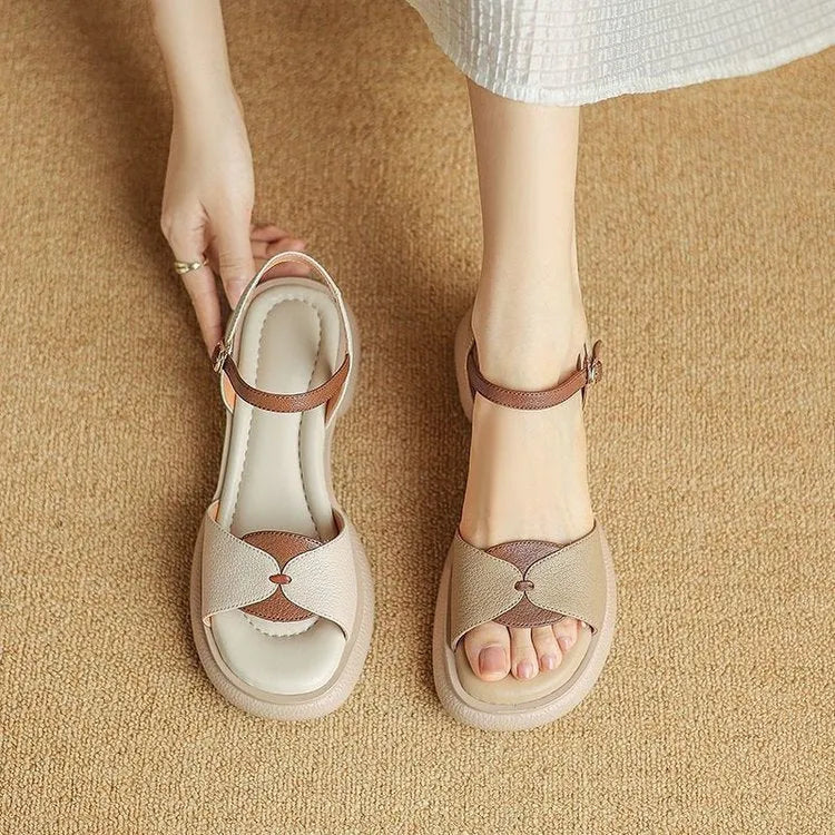 Beige women's chunky heel platform sandals with an open toe and rubber sole.