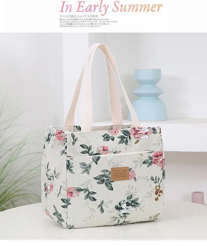 Women's portable printed canvas bag in horizontal square shape with floral design, showing reinforced base and large capacity.