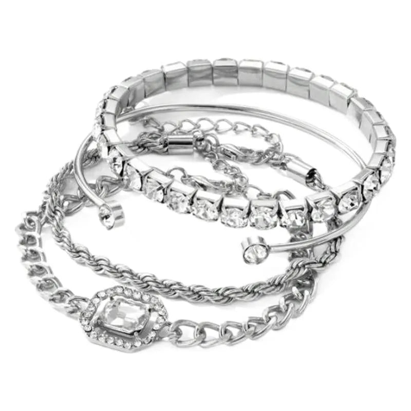 Women's four-piece alloy jewellery set with geometric square diamond shapes and chain links in gold finish