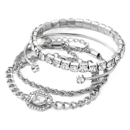Women's four-piece alloy jewellery set with geometric square diamond shapes and chain links in gold finish