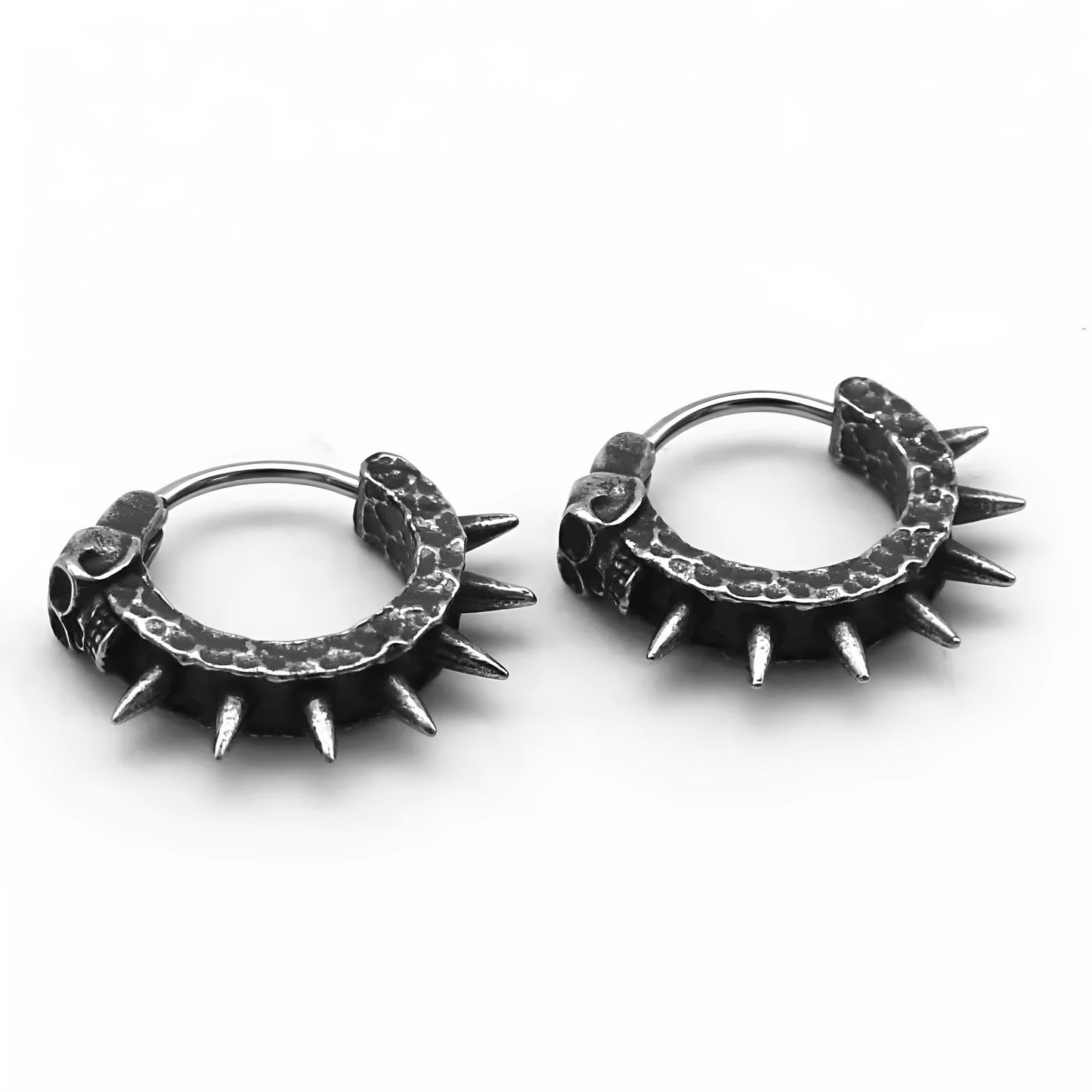 A pair of black vintage-style dangle earrings shaped like detailed motorcycles with a copper tone, on a white background.