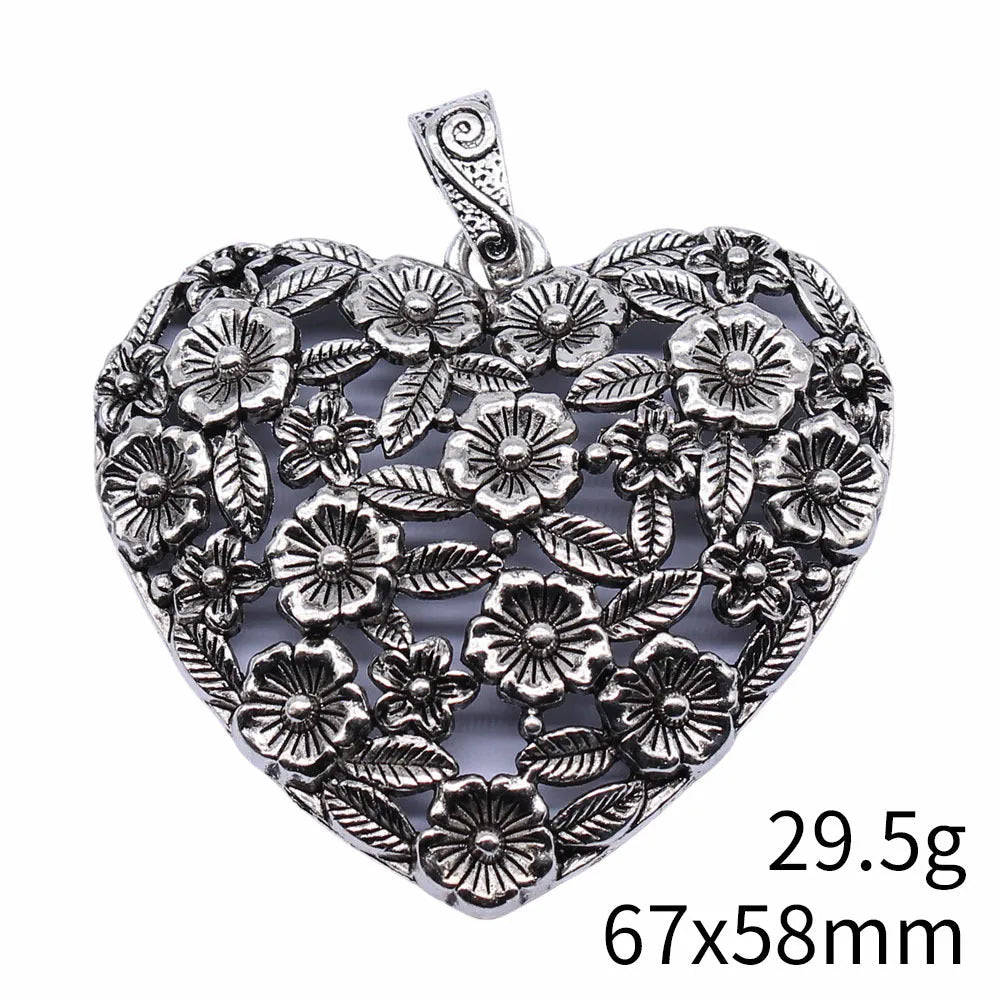 Ancient silver hollow flower love alloy pendant measuring 67mm by 58mm