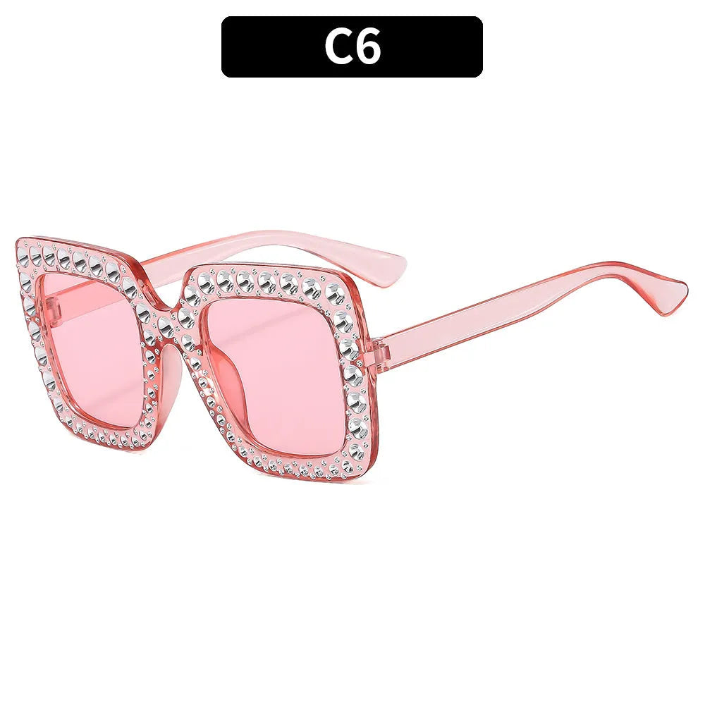 Plastic sunglasses in various colour combinations for sun protection during travel and cycling