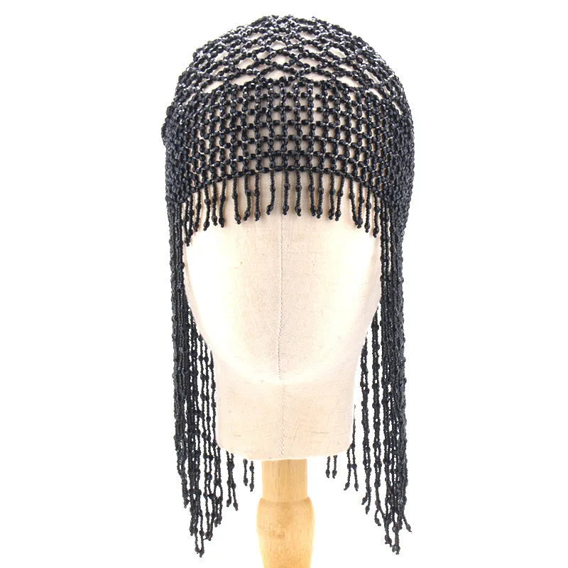 Silver and black belly dance hat with handmade beading and long tassels for performance hair ornamentation