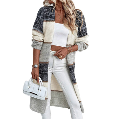Grey striped women's knitted cardigan with long sleeves and loose fit design