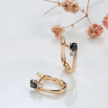 Gold geometric drop earrings with black agate gemstone inlay and retro styling