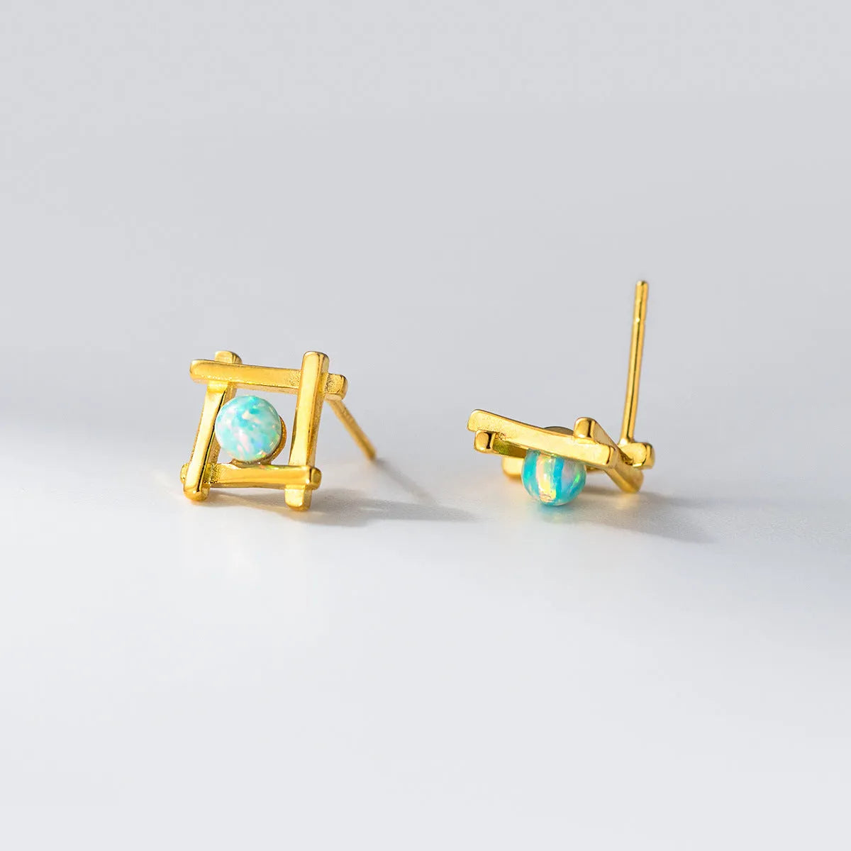 Geometric cross quadrangle stud earrings in S925 silver with silver or gold plating options