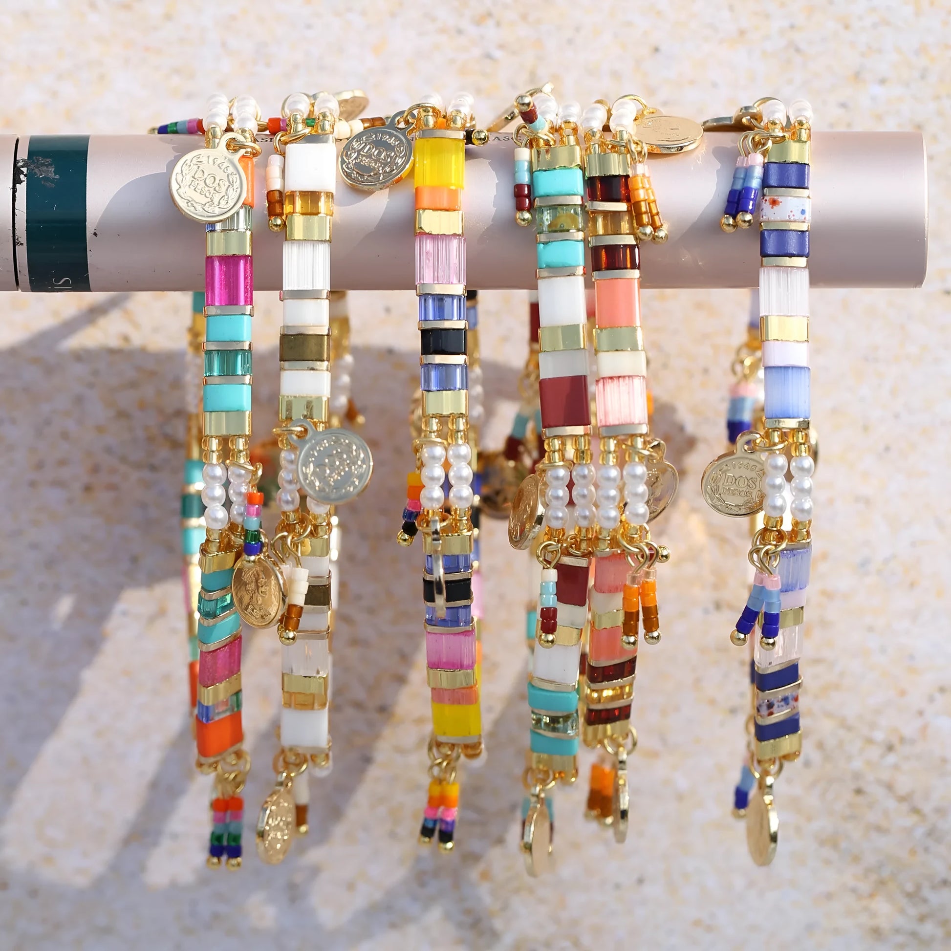 Women's handcrafted bracelet with imitation pearl and coloured glass beads in one of six colour styles.