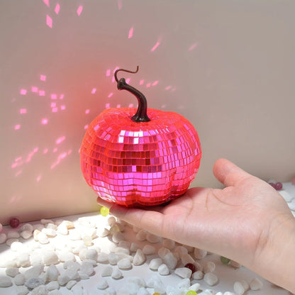A Chinese-style embroidered glass pumpkin Halloween decoration in various sizes.
