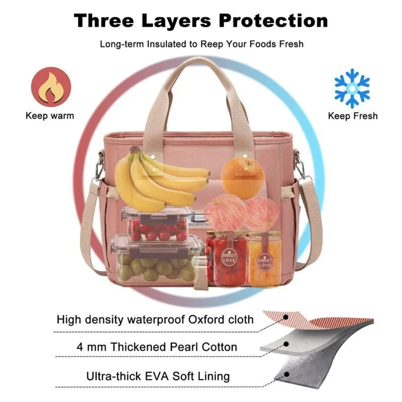 Insulated cube-shaped picnic bag with a removable shoulder strap in pink, shown with a side pocket.
