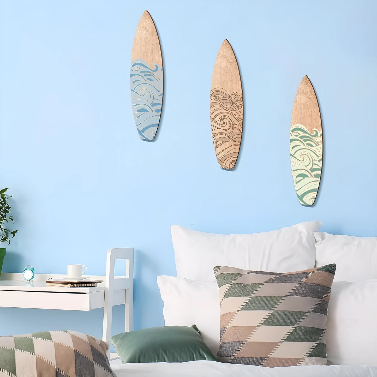 Three identical wooden surfboard wall decorations in European style design