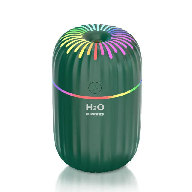 Mini USB aromatherapy humidifier in green, pink or white with 75x75x116mm dimensions and 0.5L water tank