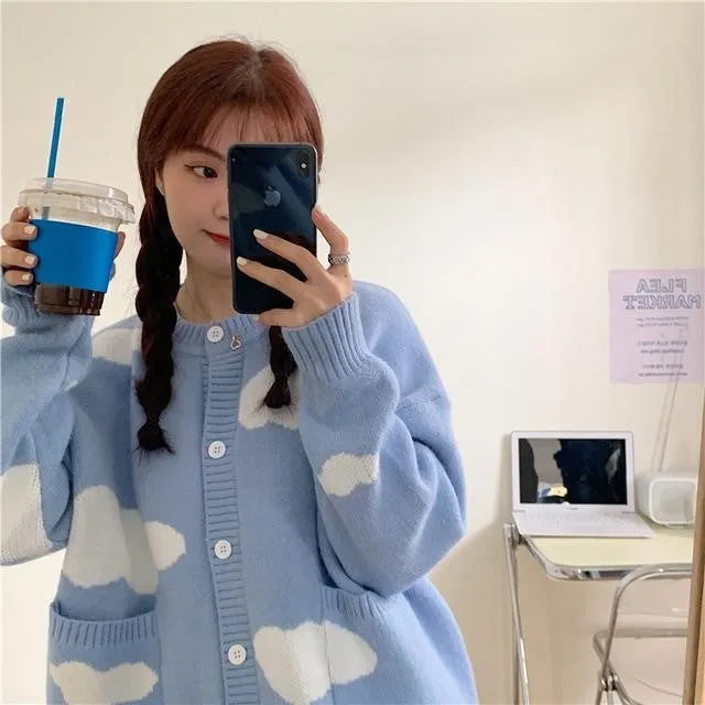 Women's loose cardigan sweater coat in blue cloud pattern with long sleeves, made from spandex fabric for autumn and winter wear, fresh and sweet style pullover with regular sleeves and normal 50cm length.