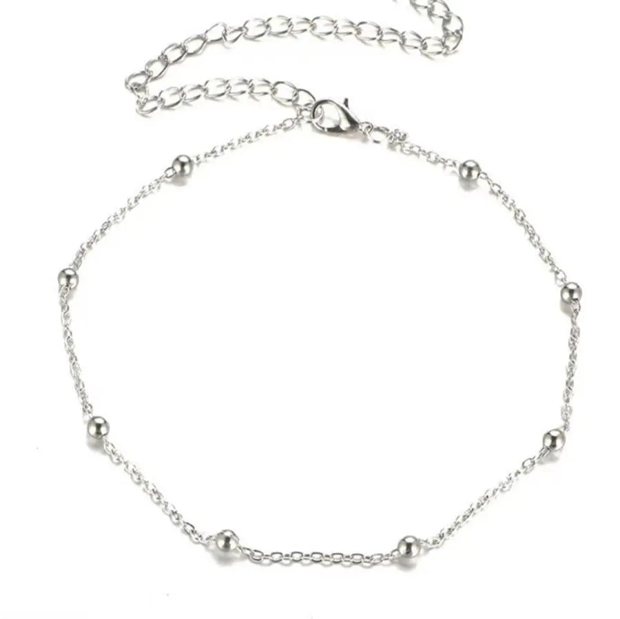 Women's adjustable Bohemian anklet with geometric pendant on twisted chain in gold or silver finish