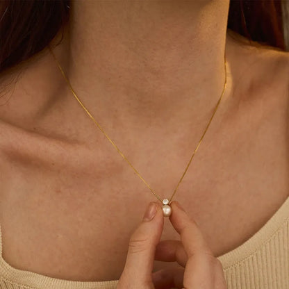 Women's stainless steel necklace with imitation pearl and zircon pendant on box chain