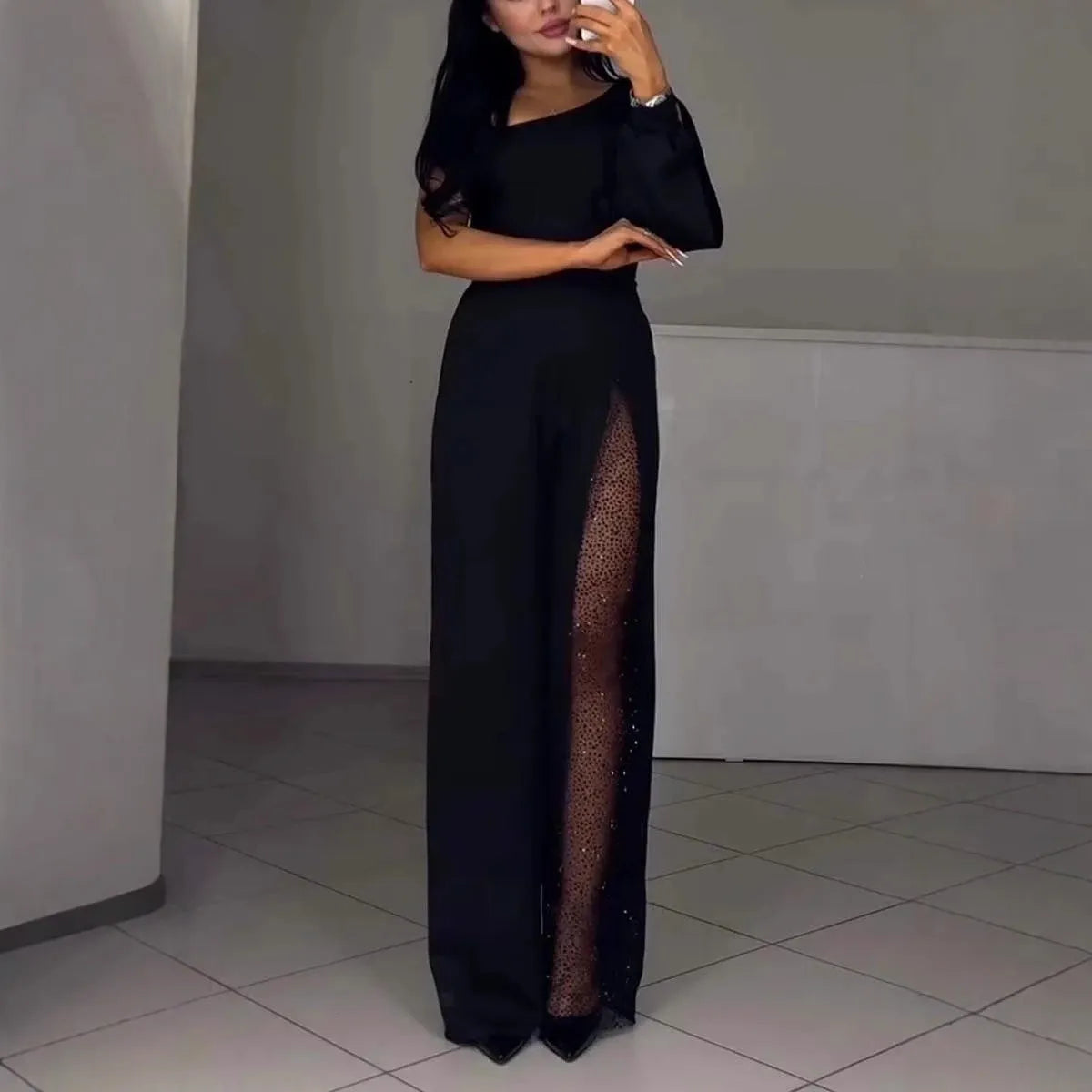 Women's polyester jumpsuit with oblique shoulder and high slit in black, wine red, white, or dark blue