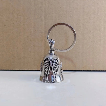 Vintage silver-tone angel wings feather keychain and necklace on a white background.