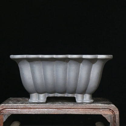 Square purple sand ceramic bonsai pot with 37cm diameter on desktop with small plant