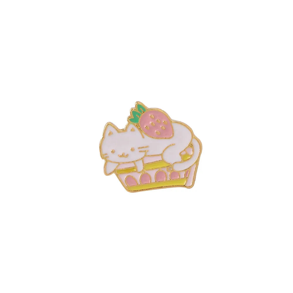 Close-up of a cute cat strawberry and dripping cake oil design metal alloy brooch pin.