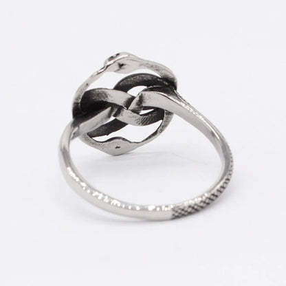 Titanium steel double snake ring in steel colour with retro design, shown on a finger.