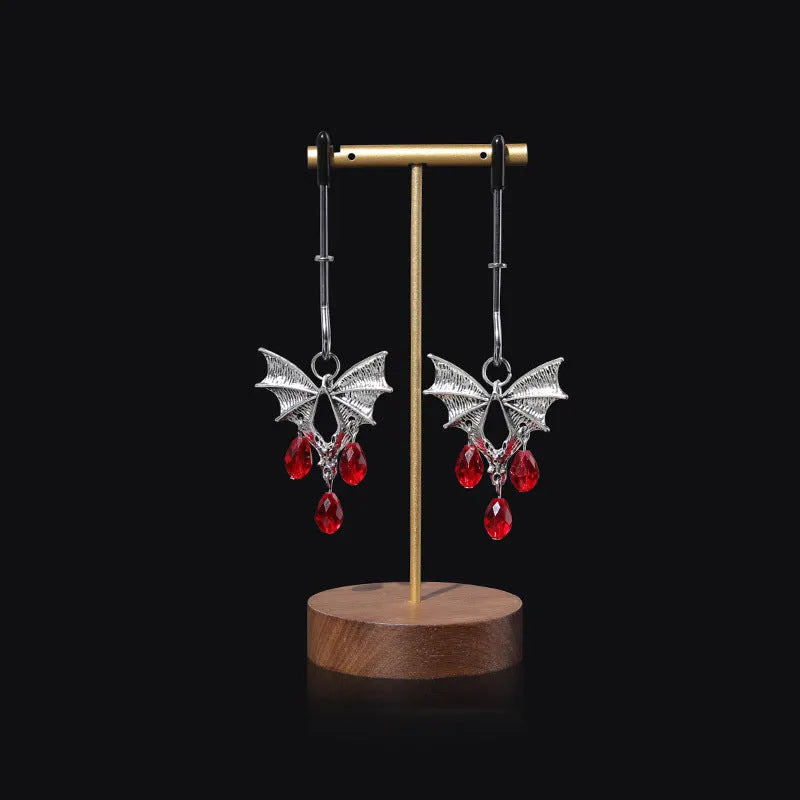 Silver bat nipple clamp with ruby design and adjustable spring mechanism