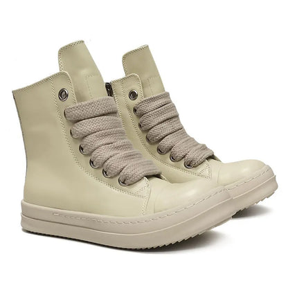 Black high-top leather sneakers with side zipper, round toe, and stitching details on genuine cowhide upper