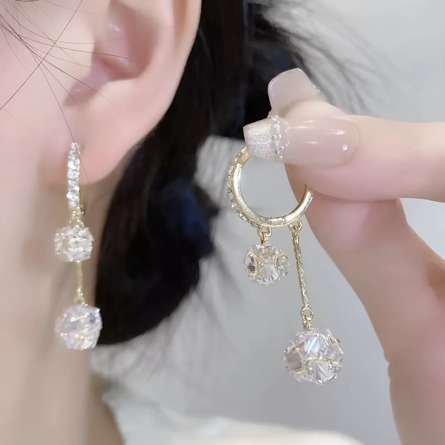 Silver colour drop shape earrings with rhinestone ball and tassel ball confession balloon design