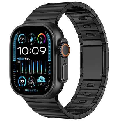 Silver stainless steel magnetic buckle strap attached to an Apple Watch on a wrist.