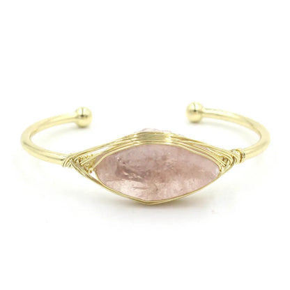 Natural raw gemstone bracelet with 8mm rough crystal beads in ethnic style, shown on wrist.