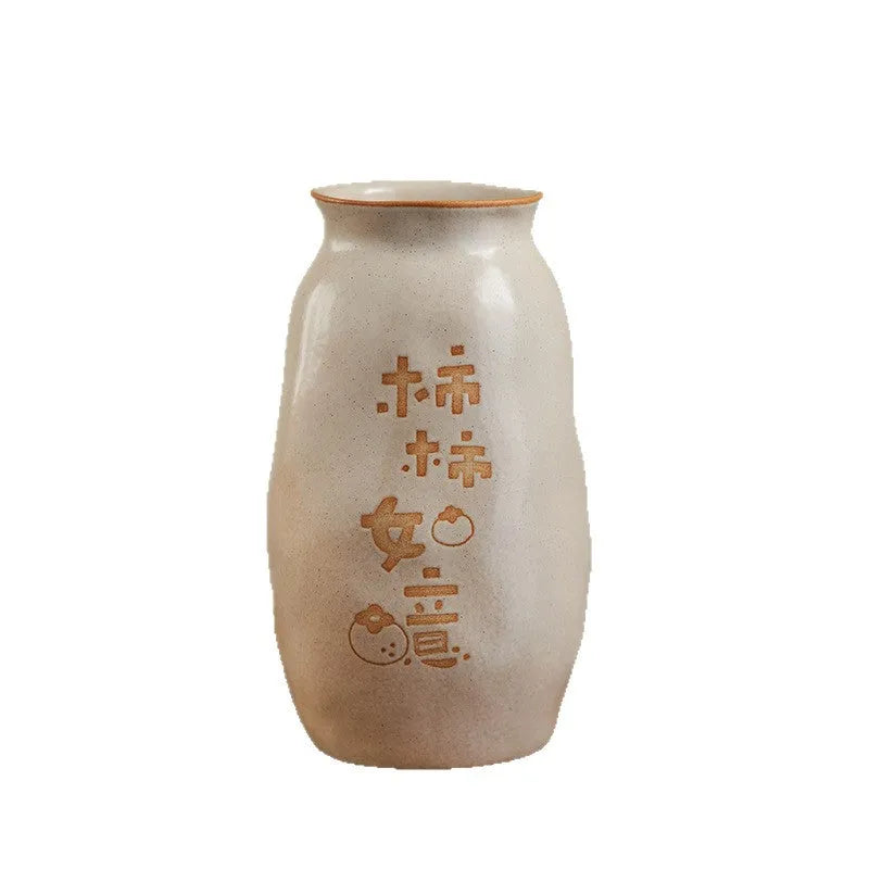 Hand-painted Chinese ceramic vase with carved detail on a desk, shown in Double Happiness colour design.