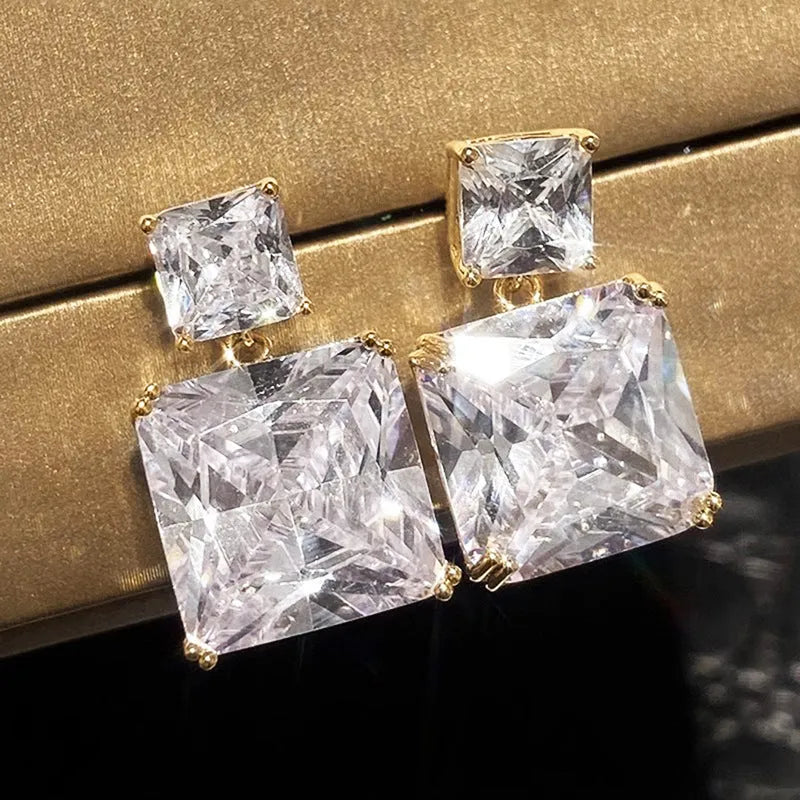 Geometric square copper earrings in white gold or gold colour with quadrilateral design for women
