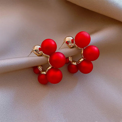 Red alloy bell-shaped drop earrings for women, showing 2.5cm length.
