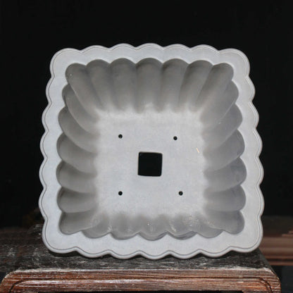 Square purple sand ceramic bonsai pot with 37cm diameter on desktop with small plant