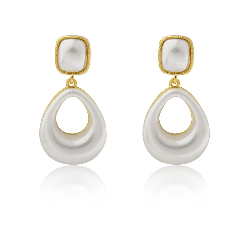 Gold-plated mabe pearl drop earrings with imitation pearl drops and office-appropriate styling