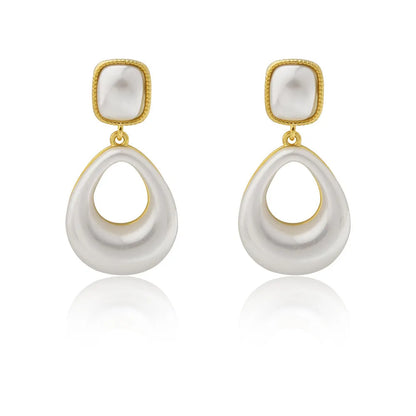Gold-plated mabe pearl drop earrings with imitation pearl drops and office-appropriate styling