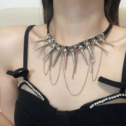 Women's leather necklace with electroplated rivet accents and round beads in winding tassel design