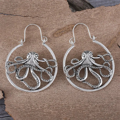 Close-up of vintage-style octopus earrings in antique silver colour with zinc alloy construction.