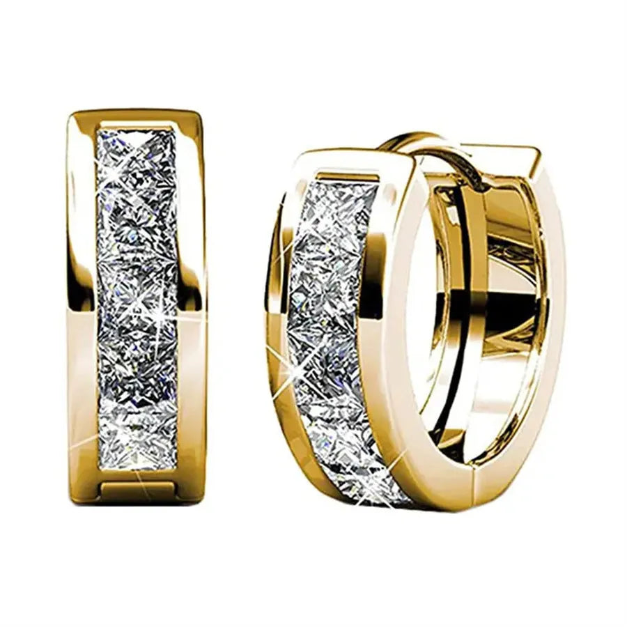 Geometric quadrilateral earrings in gold or silver plating, showing structured design and smooth surface finish