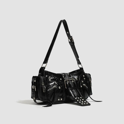 Black dumpling-shaped retro women's shoulder bag with a front pocket and organiser interior.