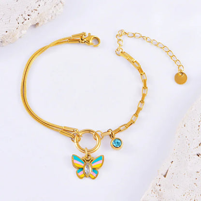 Gold titanium steel jewellery set with colourful epoxy butterfly pendant necklace and matching bracelet