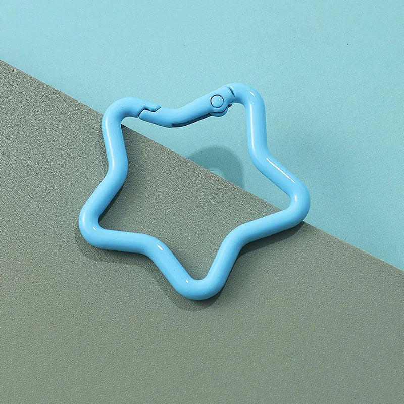 Zinc alloy five-pointed star keychain in various macaron colours.