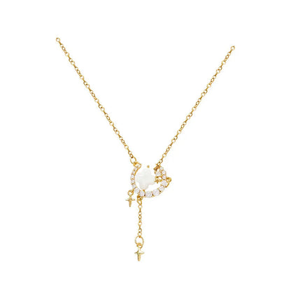 Women's sparking zirconium necklace showing star and moon pendant on adjustable chain