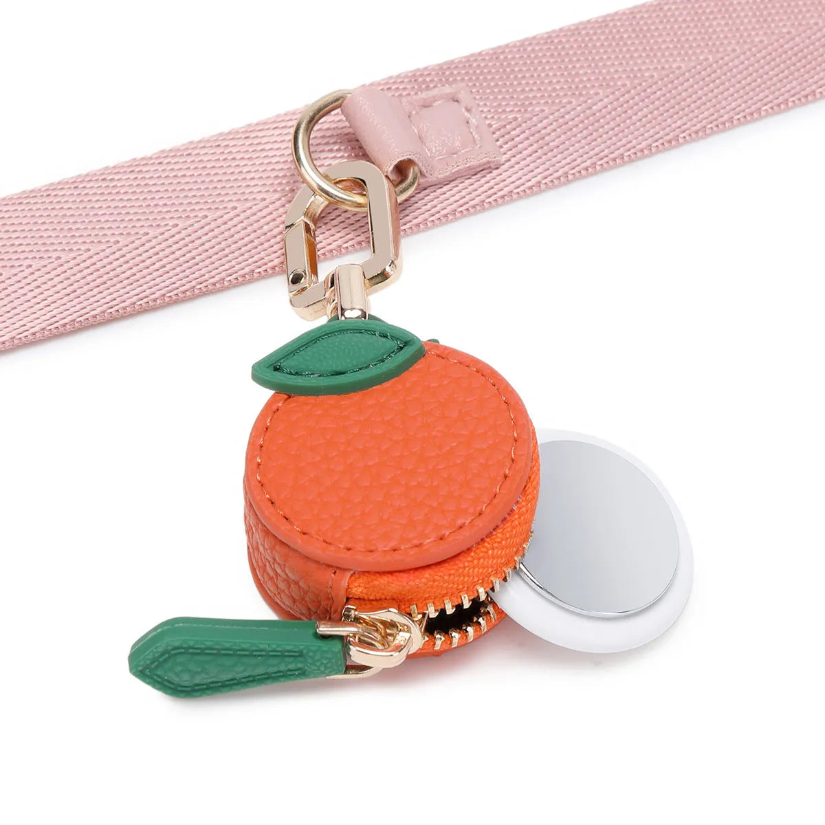 Small solid colour PU leather keychain coin bag in cherry, blueberry, or orange.