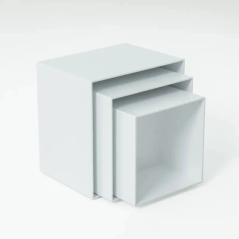 Six acrylic cubes in graduated sizes 3-8cm for dessert display, available in transparent or white