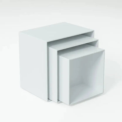 Six acrylic cubes in graduated sizes 3-8cm for dessert display, available in transparent or white
