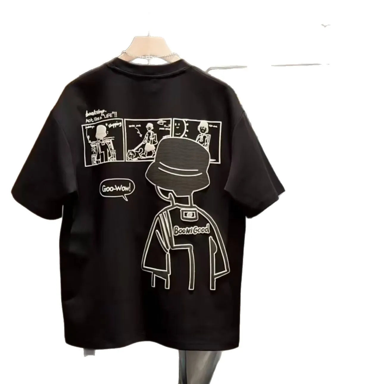 Men's black cotton short sleeve t-shirt with a cartoon print, showing crew neck and straight cut.