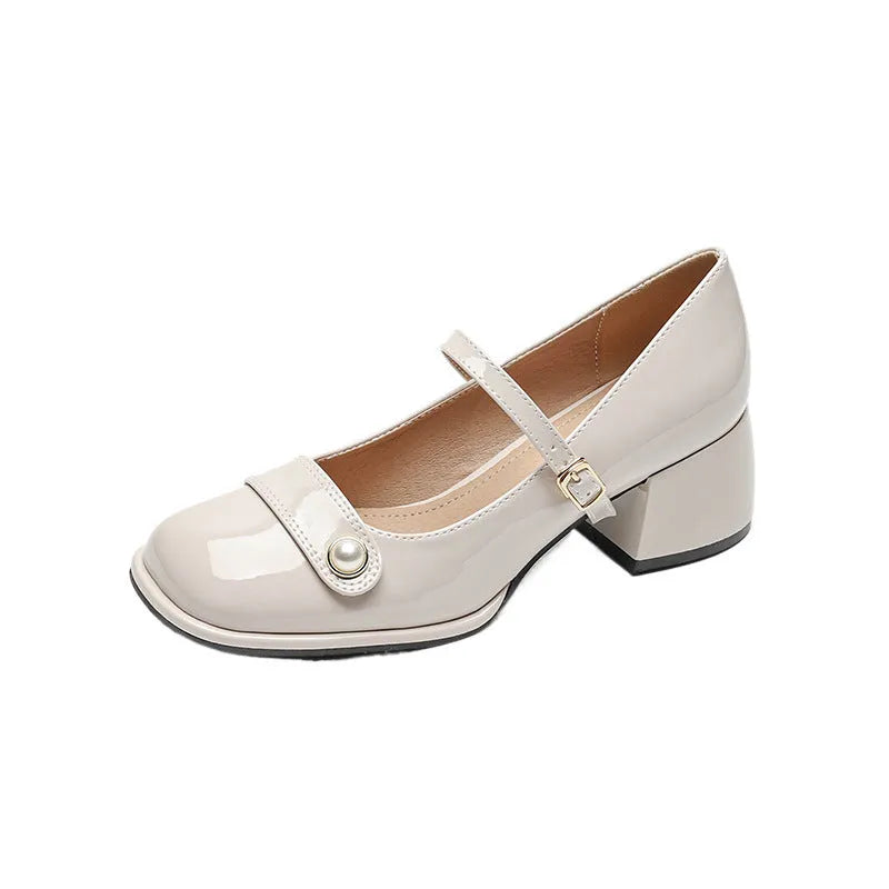 Women's apricot patent leather chunky heel ankle strap pumps with a square toe on a white background