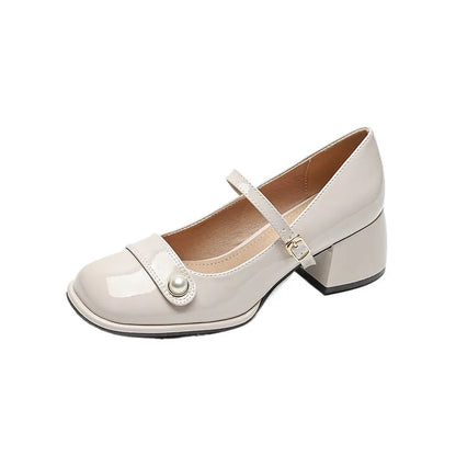 Women's apricot patent leather chunky heel ankle strap pumps with a square toe on a white background