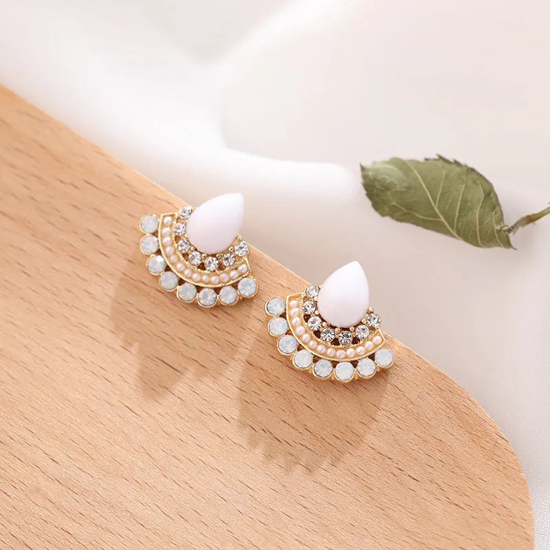 Women's retro sterling silver needle opal fan-shaped rhinestone earrings with geometric design and electroplated finish.