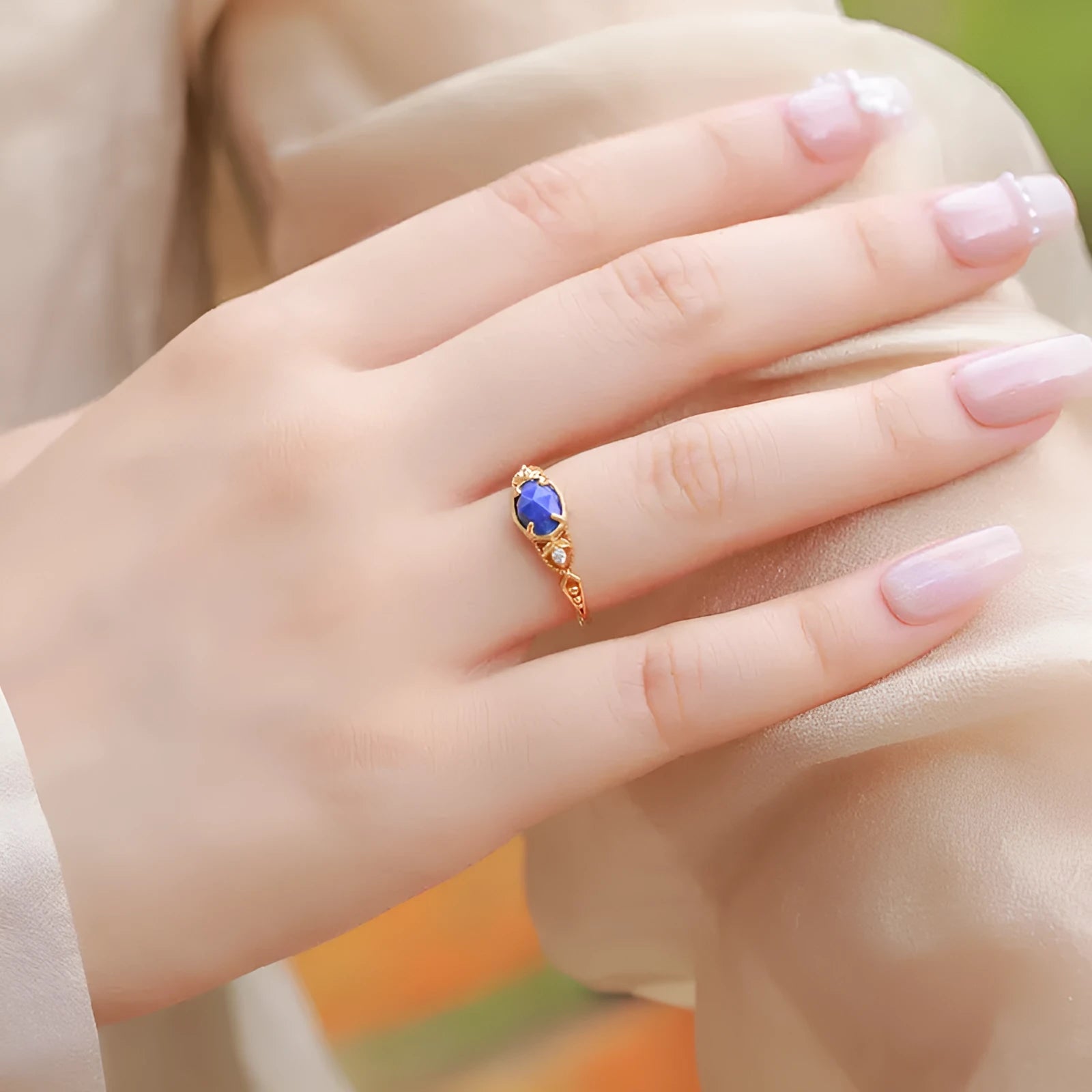 Japanese style lapis lazuli ring with sterling silver ellipse setting and adjustable sizing